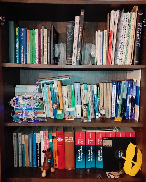 A bookshelf full of technical literature